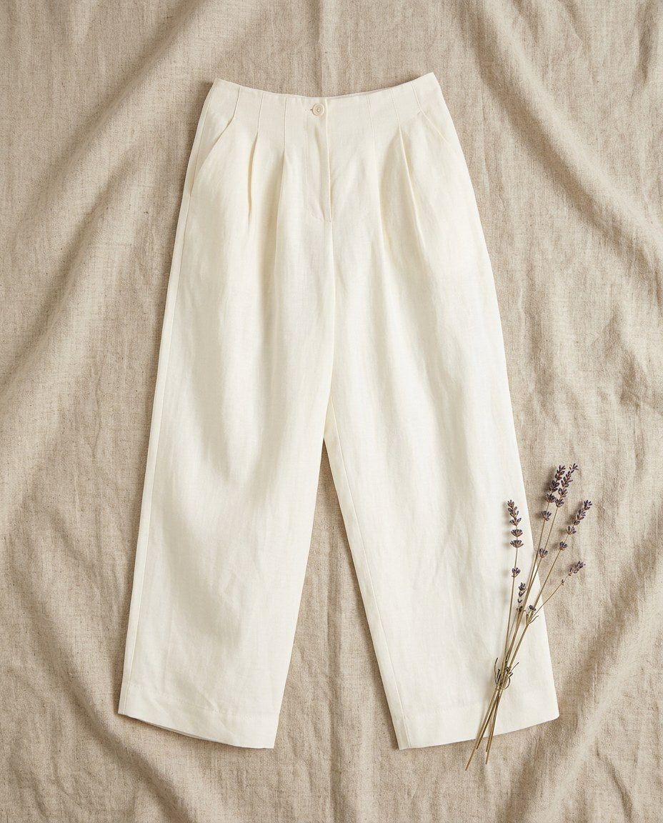 The Chapel Pleated Trouser in Ivory, flat lay